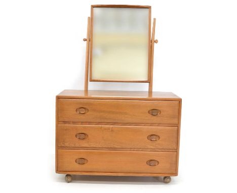 Ercol elm dressing chest table, with swing mirror and three, graduated drawers, 91cm (36in) wide, 49cm (19in) deep, 137cm (54