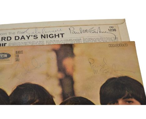 Two signed Beatles LP's by John Lennon &amp; Paul McCartney. The first is The Beatles, 'Hard Day's Night' which has songs fro