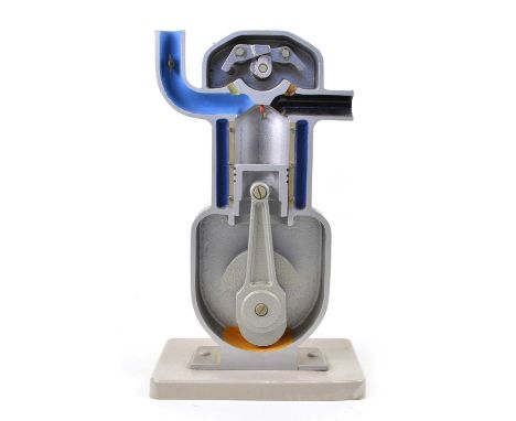 Aluminium handpainted cutaway model of a single cylinder engine with a composite base. Hand cranked. 22cm (9") wide, 14cm (5.