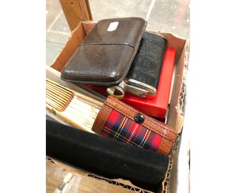 A mixed lot comprising a leather cigar case, cigar cutters, a pewter hip flask, stainless steel shot glasses and a wooden fan