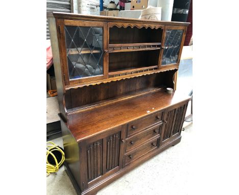 Oak linen fold panel dresser with plate rack 
