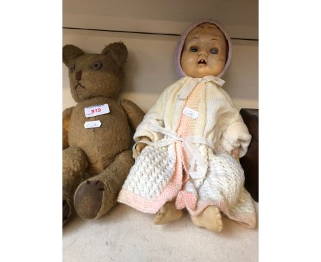 Vintage teddy bear and plastic doll 