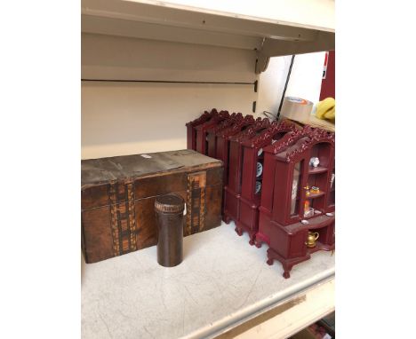 Miniature dressers with ornaments and a damaged tea caddy 