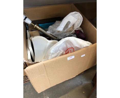 A box of misc including linen, table lamp, bathroom scales, etc 