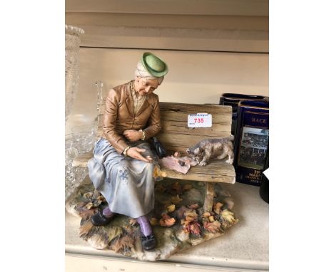 Italian porcelain woman on a bench 