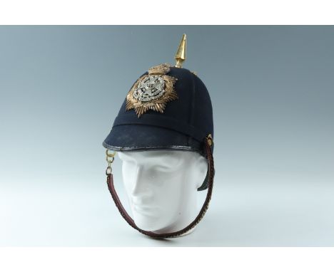 A 1912 dated British army other rank's Home Service Pattern helmet bearing a Border regiment helmet plate