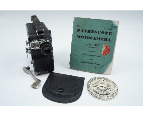 A Pathescope H cine camera, together with manual and a exposure indicator