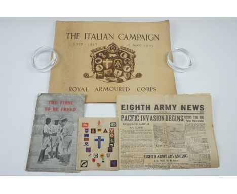 A group of Second World War British military publications including a 1943 issue of "Eighth Army News" and a history of the R