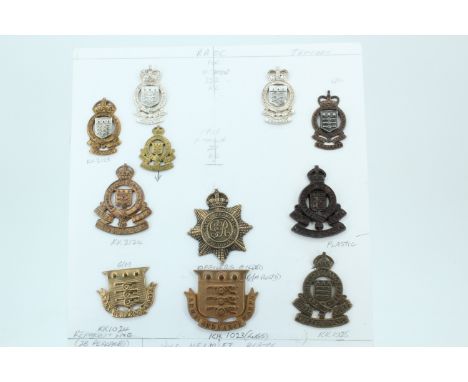 A group of Army Ordnance Corps cap badges