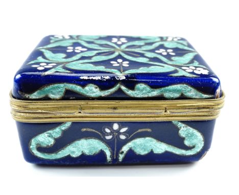 A fine late 19th Century gilt-mounted enamelled copper trinket box, bearing stylized symmetric floral decoration incorporatin