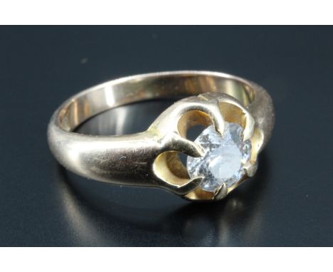 A diamond solitaire ring, having a brilliant cut round diamond of approximately 0.75 carat in a six point basket setting betw