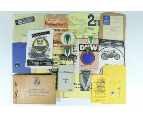 A quantity of DKW / Auto Union period publications, car bumper and other badges, data plates, an Auto Union stick pin etc