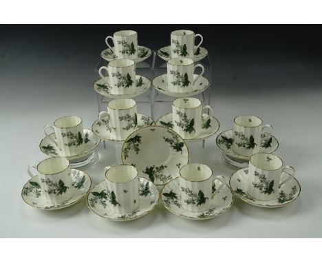 A set of 12 Royal Worcester "Valencia" coffee cans and saucers, one spare saucer