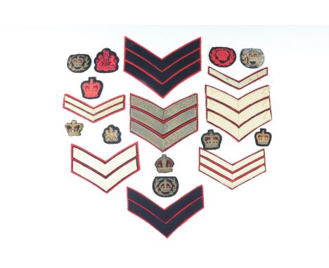 A group of army dress rank insignia
