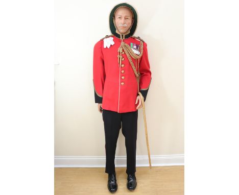 A mannequin display representing an early 20th Century Indian Army officer in ceremonial dress, (the medals replicas)