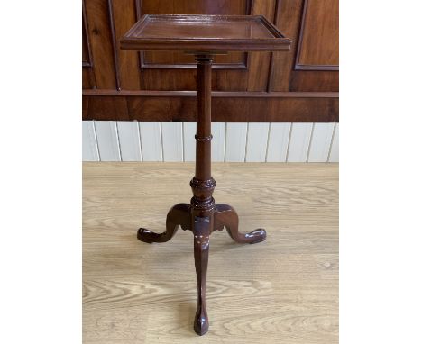 A reproduction Georgian square-topped mahogany tripod lamp table, 64 cm high