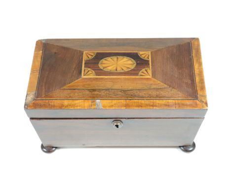 A late Georgian marquetry-inlaid rosewood three-compartment tea caddy, of sarcophagus form, the lid decorated with an inlaid 