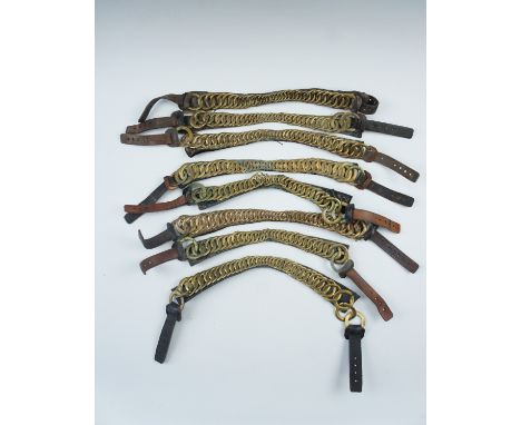 A quantity of Guards bearskin chin scales