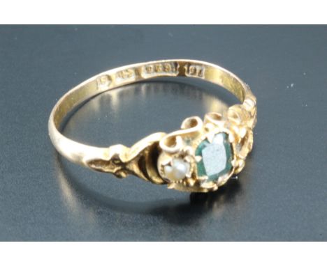 A Victorian emerald and seed pearl finger ring, set with an emerald-cut of approximately 4 mm x 3 mm on 15 ct gold, O/P, 1.3 