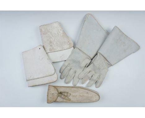 A British army musician's buff leather fife case, together with a pair of Household Cavalry buff leather gauntlets, and cuffs