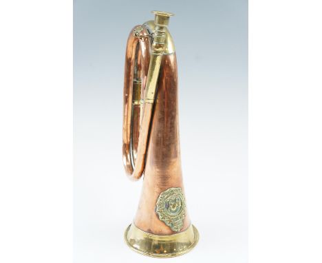 A reproduction military bugle bearing a Canadian Ontario Regiment badge