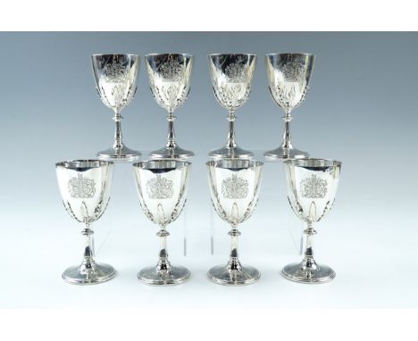 A set of eight Queen's Silver Jubilee commemorative heavy silver goblets, each having a radial-leaf-moulded bowl and knopped 