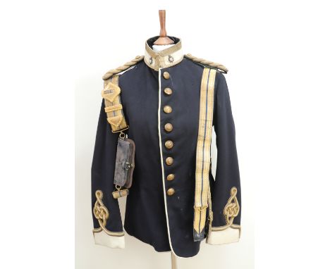 An early 20th Century Army Service Corps officer's dress frock and sword belt
