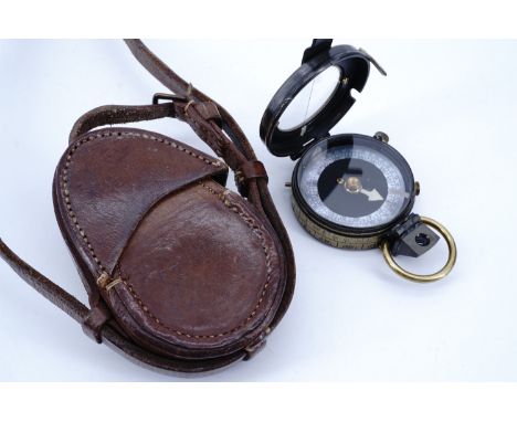 A cased 1917 British Army prismatic marching compass