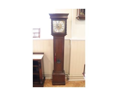 An early 18th Century style mahogany long case clock having an 8 day movement with brass face bearing a silvered chapter engr