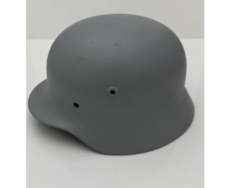 A German WWII helmet M40 Q64. Repainted.