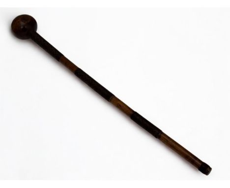 Zulu 19th century ceremonial or induna's darkwood knobkerrie, small head, the haft largely covered with zig zag pattern iron 