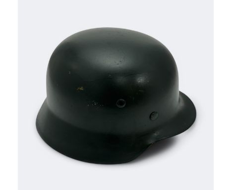 A WWII German M35 NS-64 Norwegian used helmet with original German liner 