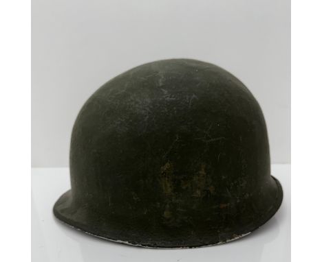 A WWII US Military Schleuter steel helmet shell, front seam.  Swivel bail missing but with spares.