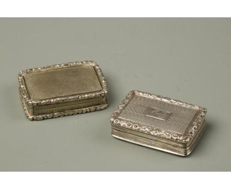 A GEORGE IV VINAIGRETTE of rectangular form with engine-turned decoration and foliate borders, the cover engraved with a name
