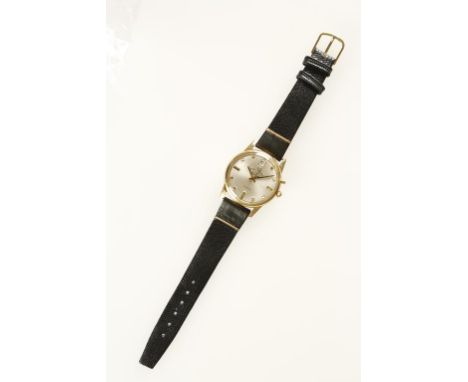 PAUL GARNIER: A GENTLEMANS YELLOW METAL WRISTWATCH, the round dial with raised gilt baton numerals, sweep seconds hand and da