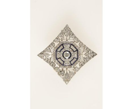 A DIAMOND AND ENAMEL PLAQUE BROOCH, the central brilliant-cut diamond set within an enamel circle, surrounded by pave-set dia