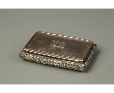 A VICTORIAN SNUFF BOX of rectangular cushion form with an engine-turned cover, initialled, with raised foliate borders and gi