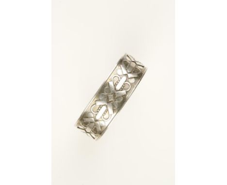 GEORG JENSEN: A SOLID SILVER TORQUE BANGLE decorated with stylised hearts. See illustration