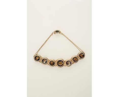 AN EARLY 19TH CENTURY MICRO MOSAIC ANIMAL PORTRAIT CHOKER NECKLACE, each circular enamelled panel decorated with a different 