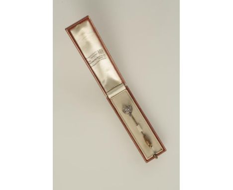 A DIAMOND-SET FOX HEAD TIE PIN with ruby eyes, in a fitted presentation case. 