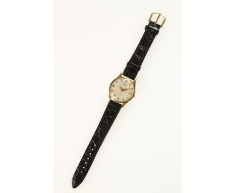 TECHNOS: A GENTLEMANS 9CT YELLOW GOLD WRISTWATCH, the round dial with raised gilt batten and Arabic numerals, sweep seconds h