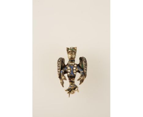 A RENAISSANCE STYLE YELLOW METAL, ENAMEL AND DIAMOND BROOCH, the body and head decorated with blue, white and green enamel, t