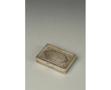 A RUSSIAN NIELLO SNUFF BOX of rectangular form, the cover decorated with a figure amongst geometric motifs, the base decorate