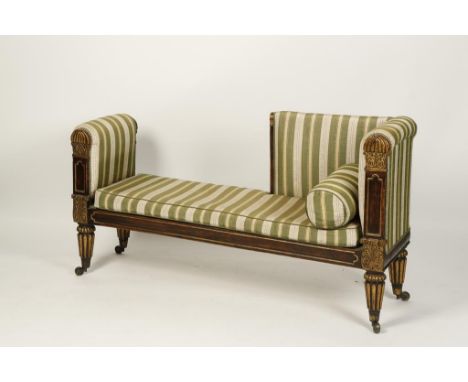 A VICTORIAN ROSEWOOD EFFECT AND GILT "CONVERSATION" SEAT with striped upholstery and carved and gilt uprights with tapering r