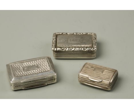 A GEORGE IV VINAIGRETTE of rectangular form with engine-turned decoration, the cover engraved with a name, with a foliate pie