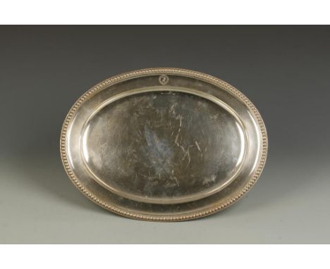 A VICTORIAN MEAT DISH of oval form with a beaded border, crested, by John Samuel Hunt, London 1854, also engraved with a reta