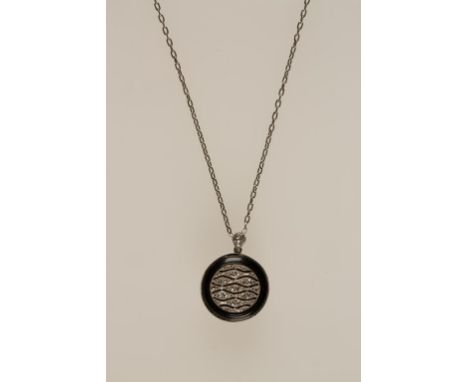 A DIAMOND AND ENAMEL PENDANT, the centre with pave-set diamonds, within an enamelled circular border, attached to a white gol