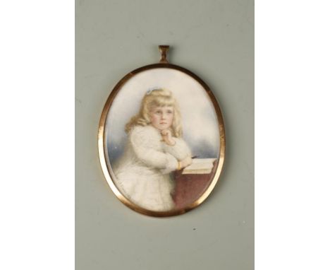 M. J. FLEMINO: A PORTRAIT MINIATURE OF A YOUNG GIRL, the girl writing at her diary, signed lower left and dated 1902, 3.75" x