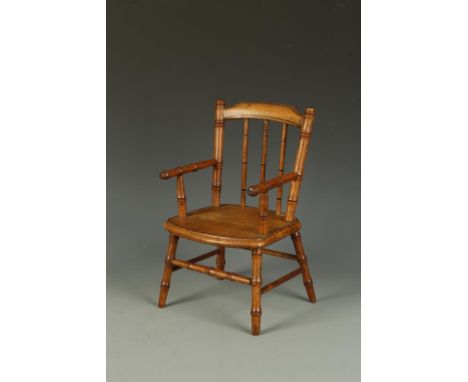 A VICTORIAN SIMULATED BAMBOO TOY ELBOW CHAIR with a solid seat, 13" high