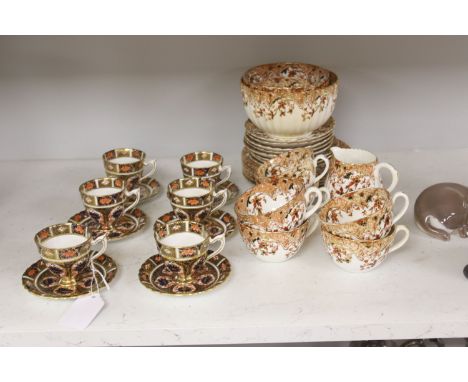   A set of six Royal Crown Derby Imari pattern coffee cups and saucers, height 6.5cm, and a quantity of other coffee and tea 